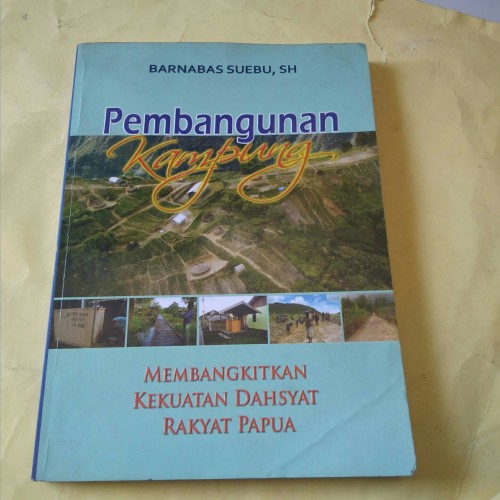 Cover PEMBANGUNAN KAMPUNG '' :  Membangkitkan Kekuatan Dahsyat Rakyat Papua / BARNABAS SUEBU, SH