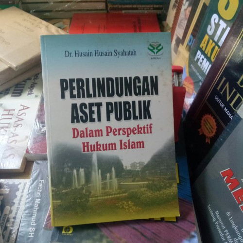 Cover PERLINDUNGAN ASET PUBLIK :  Dalam Perspektif Hukum Islam / Dr. HUSAIN HUSAIN SYAHATAH