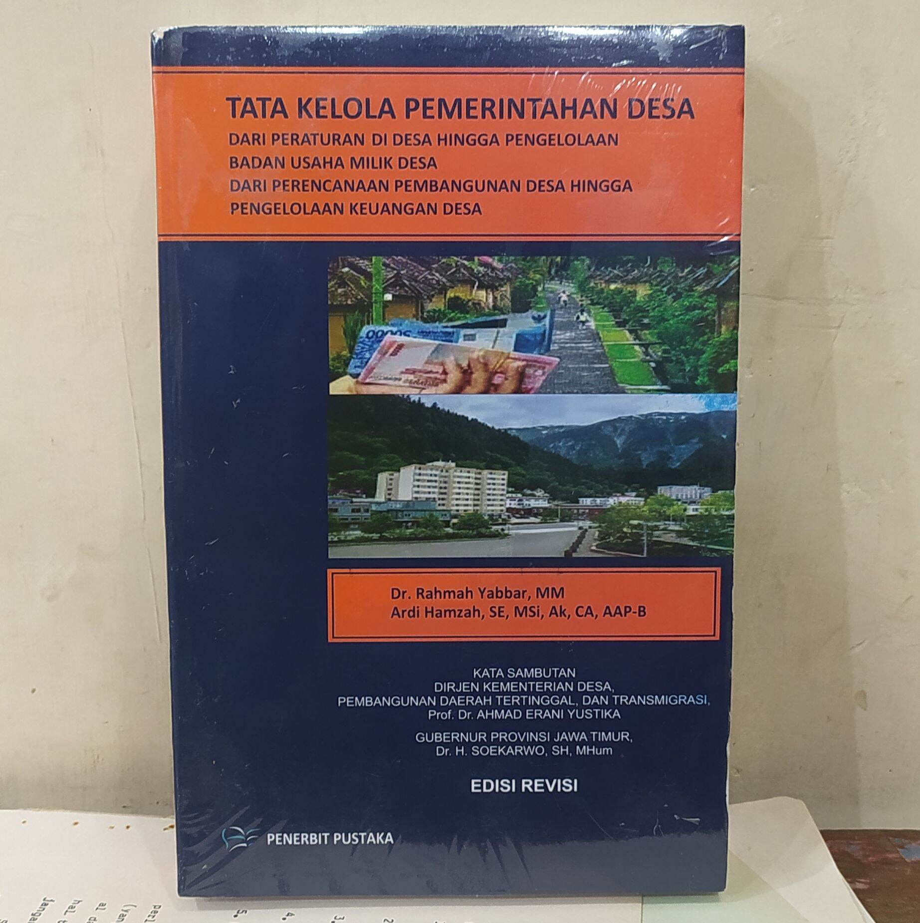 Cover TATA KELOLA PEMERINTAHAN DESA :  DARI PERATURAN DI DESA HINGGA PENGELOLAAN BADAN USAHA MILIK DESA DARI PERENCANAAN PEMBANGUNAN DESA HINGGA PENGELOLAAN KEUANGAN DESA / Dr. RAHMAH YABBAR, MM